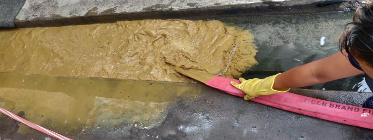 removing sediments and sludge with pumping machine- water tank cleaning service